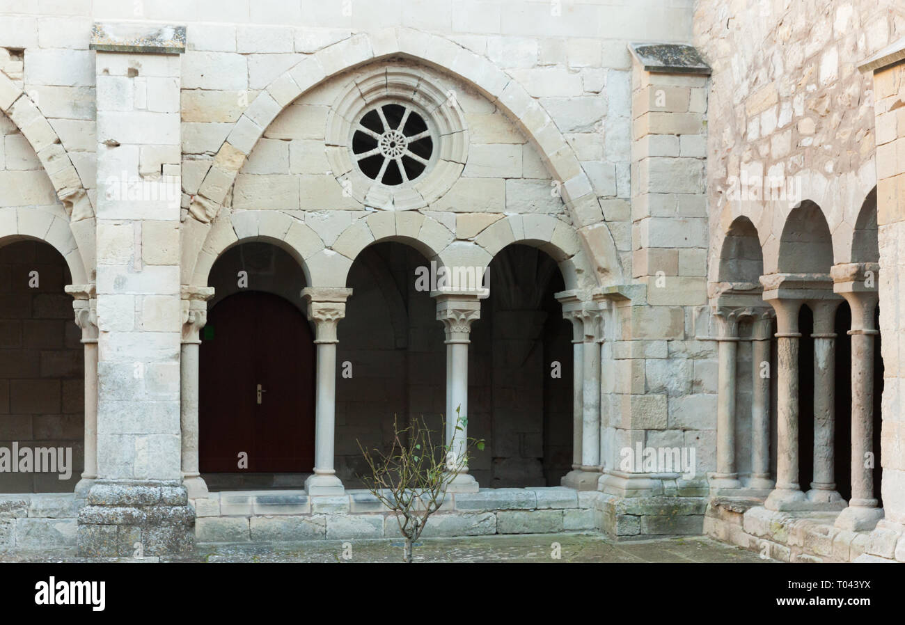 View of eastern Romanesque wing of cloister in Monastery of Santa Maria de Vallbona, Urgell, Catalonia, Spain Stock Photo
