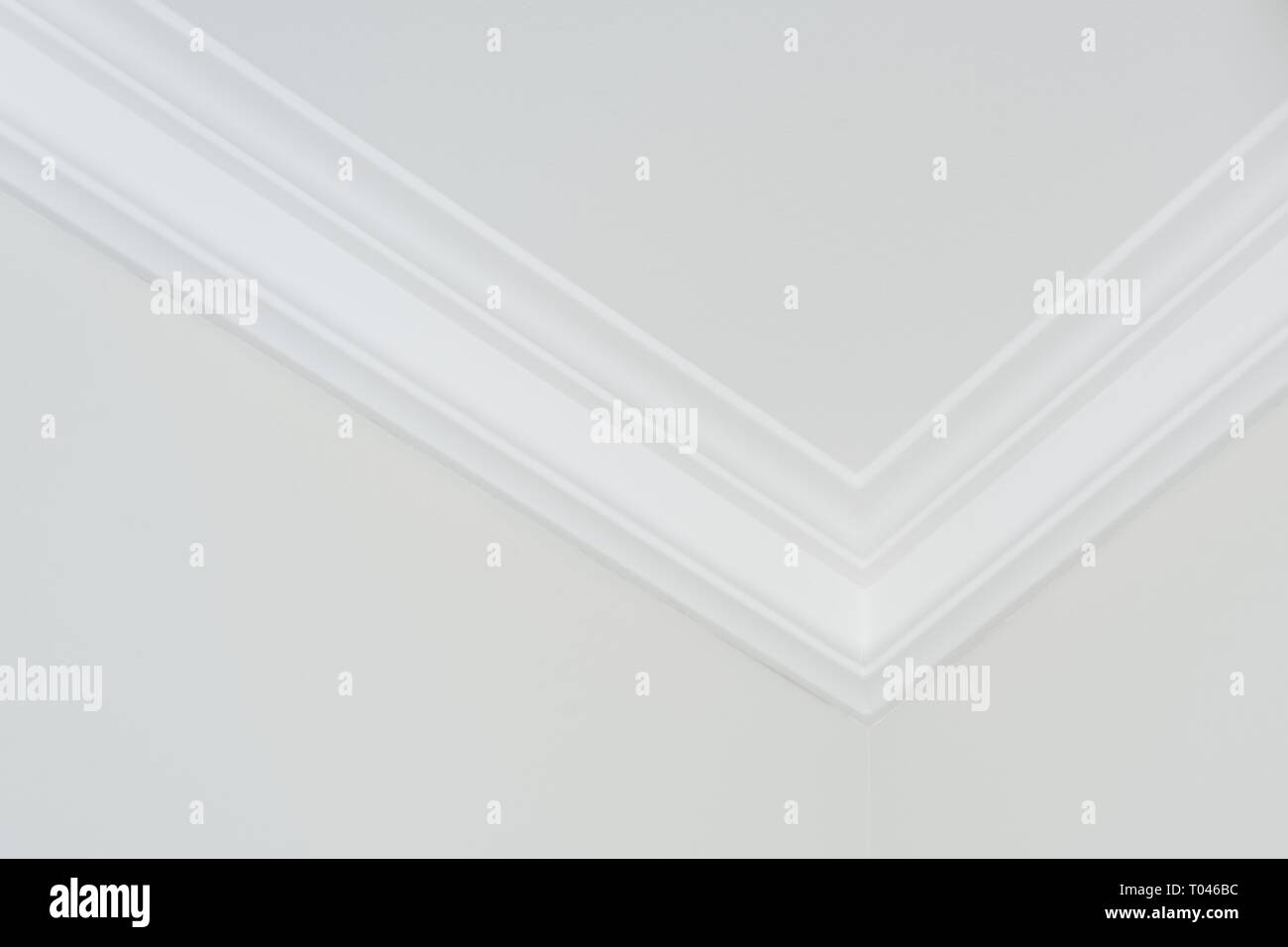 Ceiling moldings in the interior, detail of corner Stock Photo Alamy