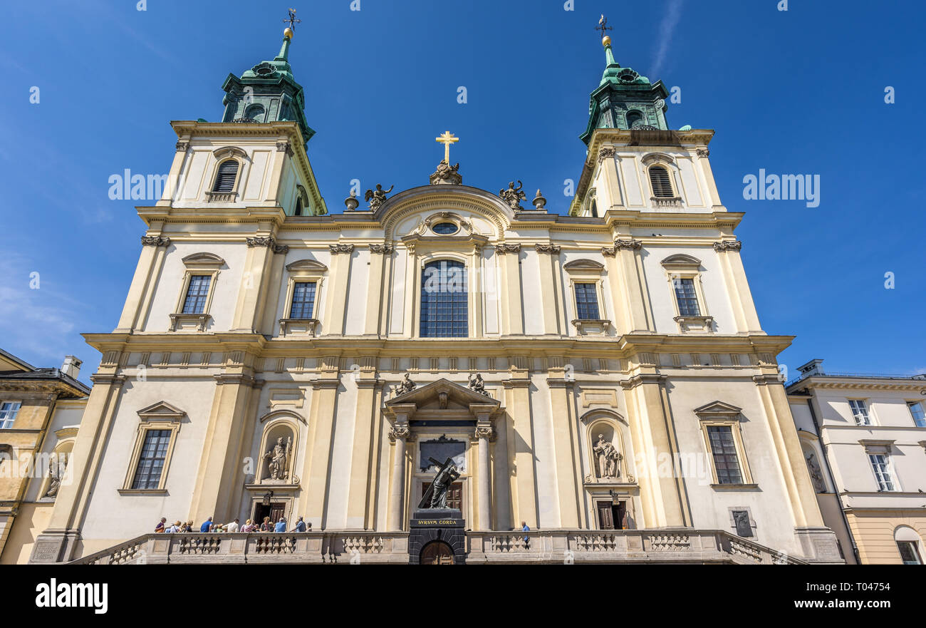 Warsaw, Poland - July 24, 2017: Church of the Holy Cross (Kosciol Swietego Krzyza) Roman Catholic house of worship located on Krakowskie Przedmiescie  Stock Photo