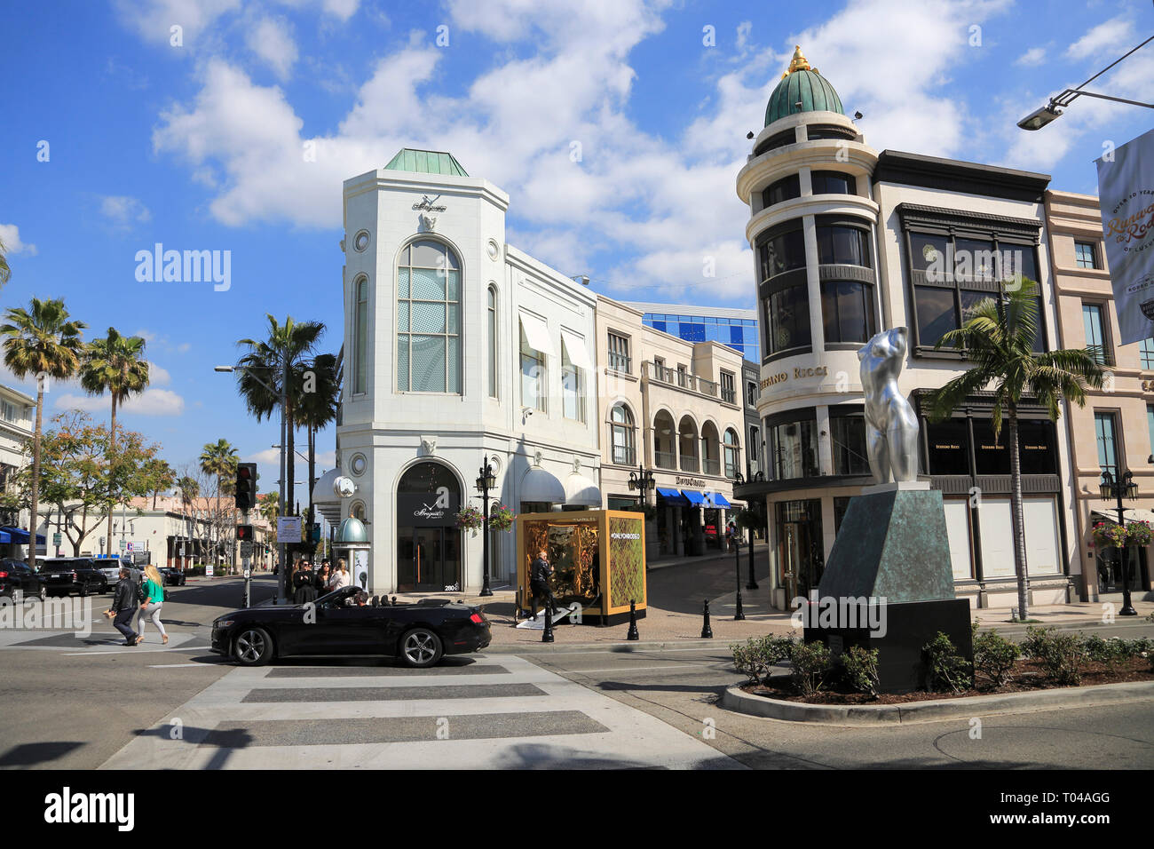 World famous Rodeo Drive symbol, Cross Street Sign, Intersection in Beverly  Hills. Touristic Los Angeles, California, USA. Rich wealthy life  consumerism, Luxury brands and high-class stores concept. Stock Photo