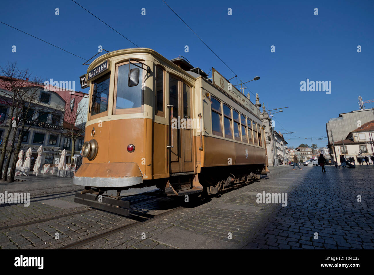 Wide angle view of a traditional tram waiting for passengers in Porto (Portugal). Stock Photo