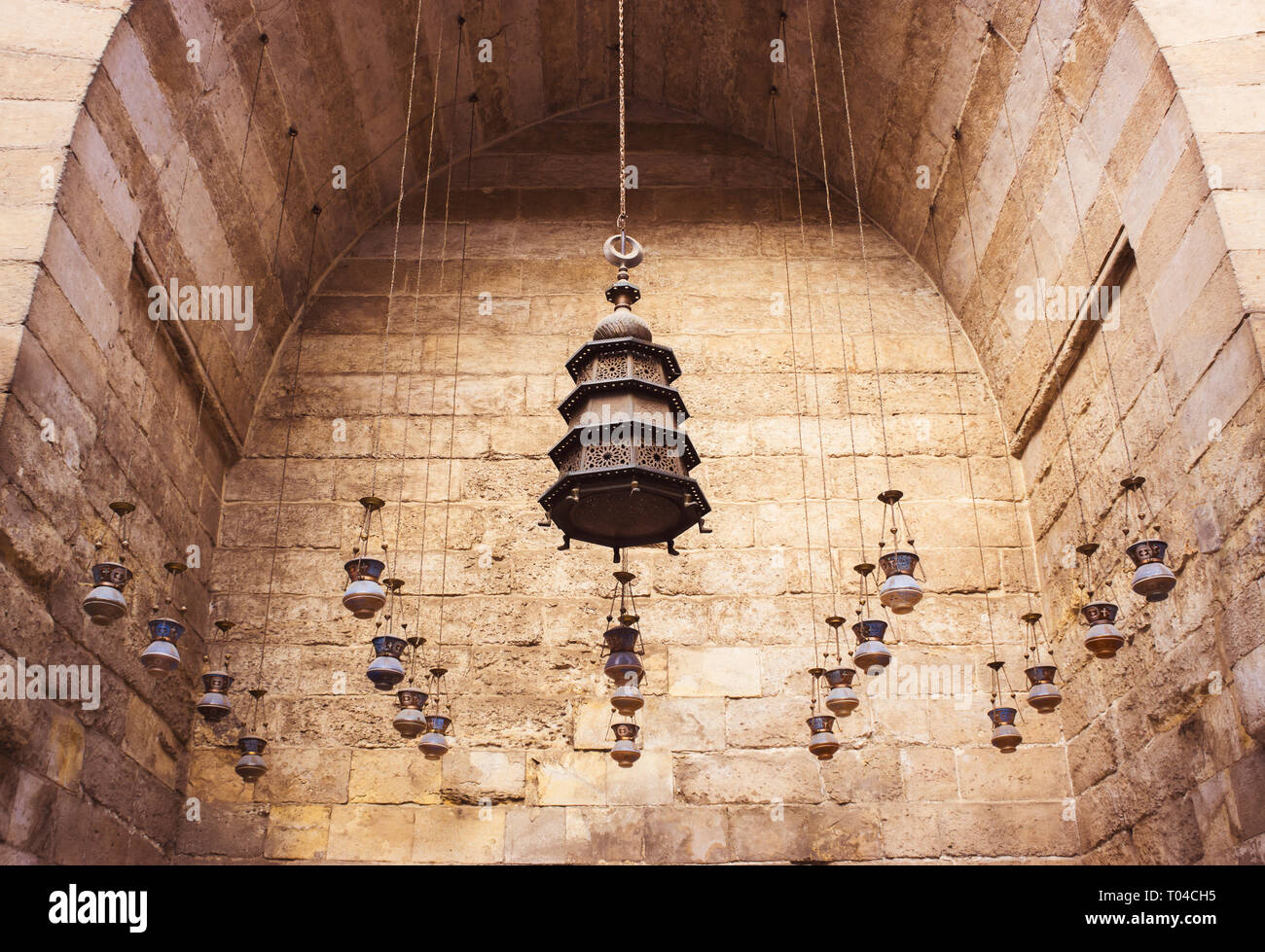 Group of lanterns hanging from the ceiling in old mosques in Cairo Stock Photo