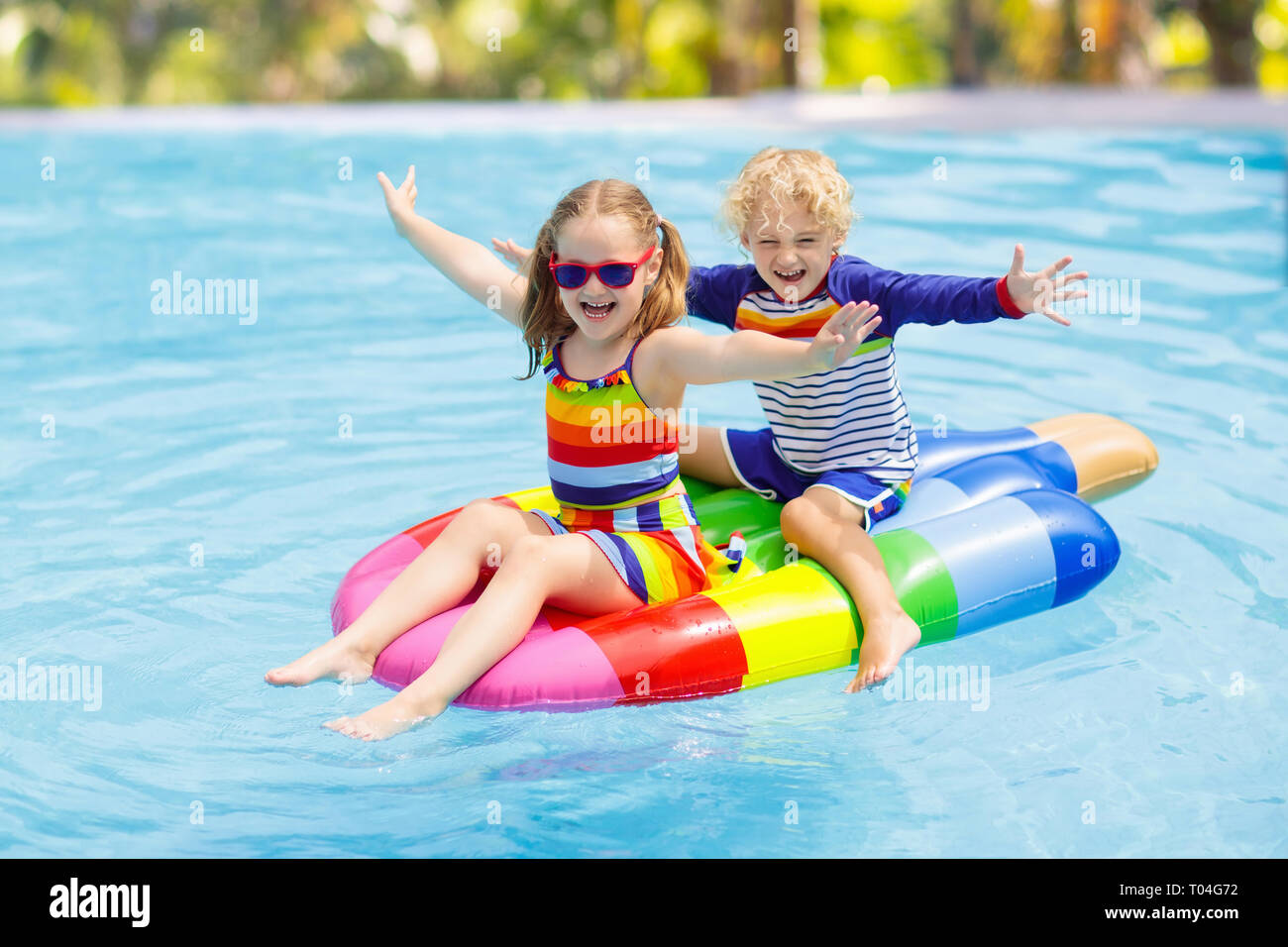 Kids on float hi-res stock photography and images - Alamy