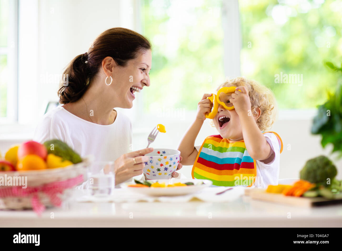 mother feeding child