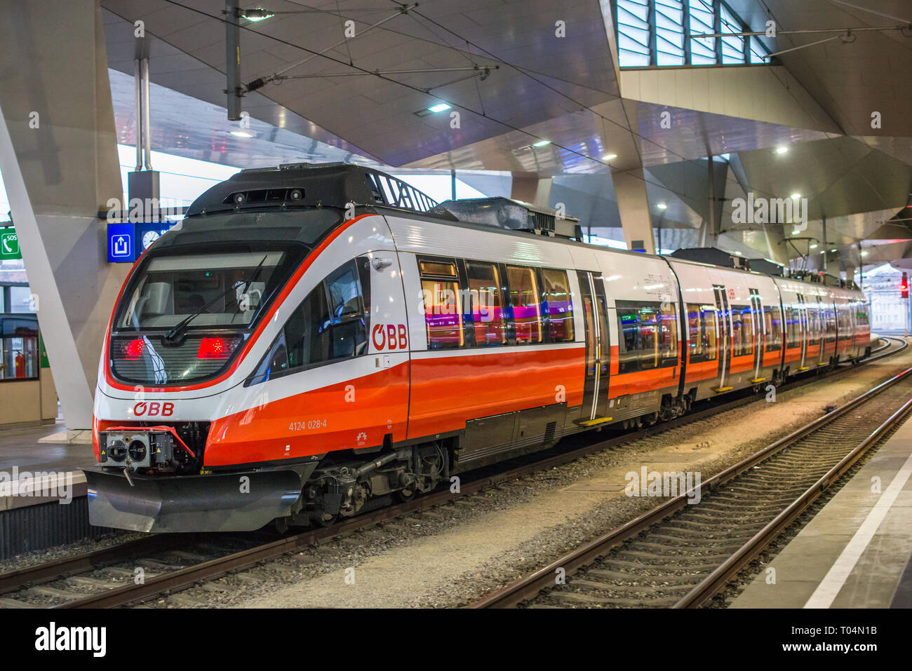 ÖBB Talent railcar approaching platform at Vienna Central station Hauptbanhauf, Austria. Stock Photo
