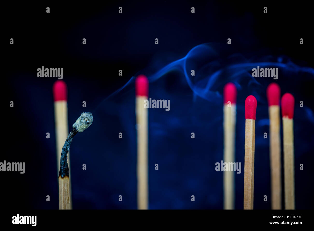 concept of being bullied till burn out, done with matches Stock Photo