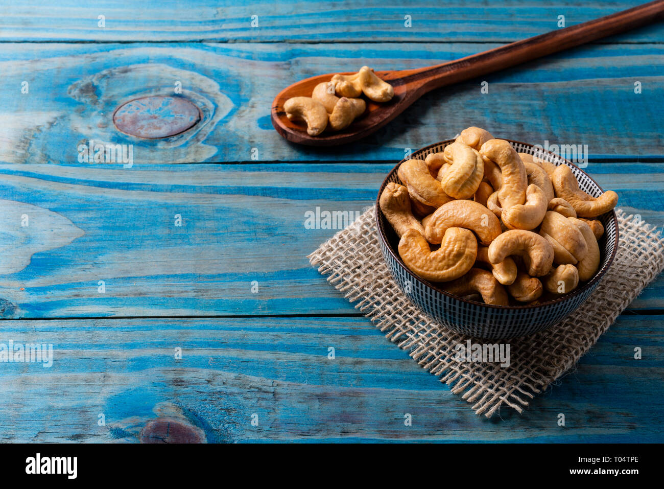 Chestnut toast inside ceramic pot over blue pine wood Stock Photo - Alamy