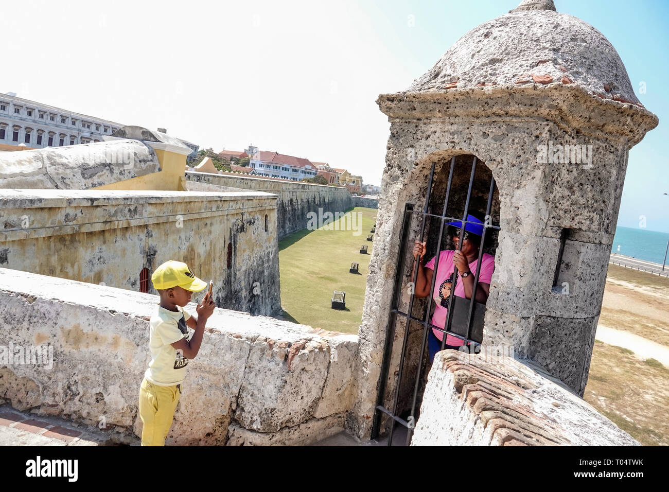 Cartagena Colombia,Baluarte de Santa Catalina,coastline fortification bulwark,Black Afro Caribbean,boy boys,male kid kids child children youngster,wom Stock Photo