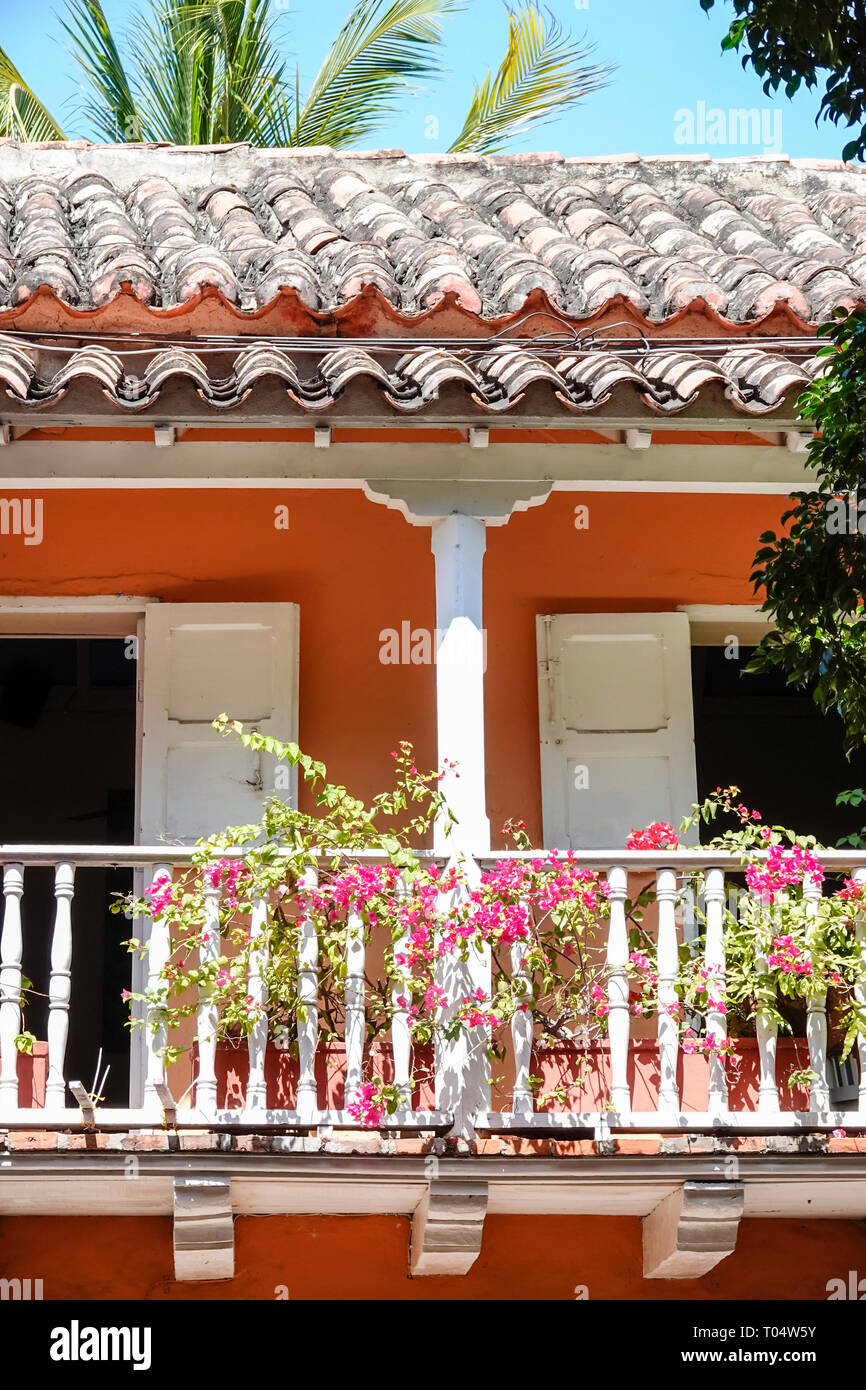 Cartagena Colombia,wood balcony,Spanish Colonial style ceramic tile roof,Bougainvillea,COL190120105 Stock Photo