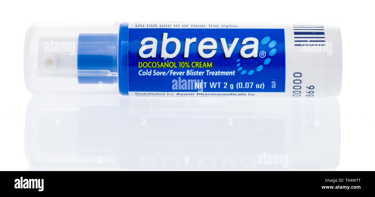 Winneconne, WI - 15 March 2019: A package of Abreva FDA approved medicine to shorten healing time for cold sores on an isolated background Stock Photo