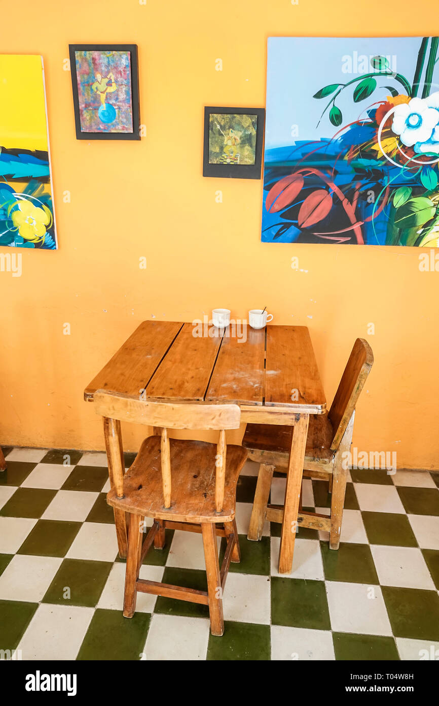 Cartagena Colombia,Center,centre,San Diego,La Cocina de Cartagena,restaurant restaurants food dining cafe cafes,inside interior,rustic table chair,art Stock Photo