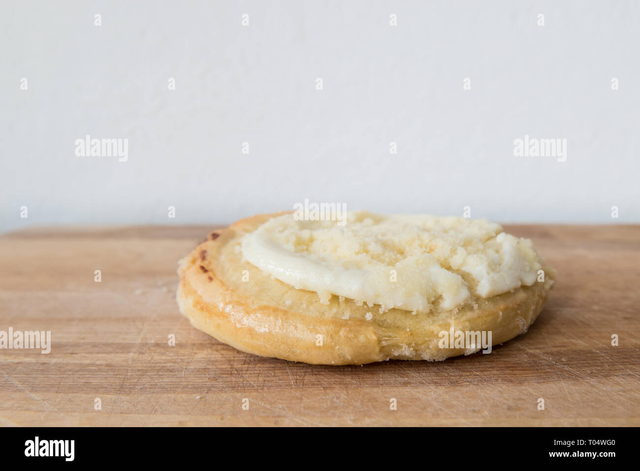 A Czech or Slovak pastry cake koláč tvarohový.  A traditional kolache or kolach with cream cheese and a streudel topping on dough. Stock Photo