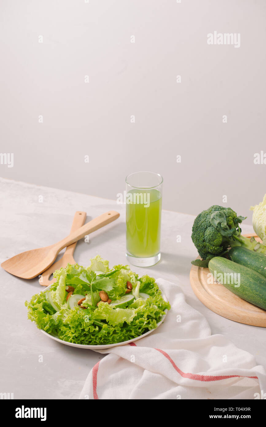 Various green organic salad ingredients on white background. Healthy lifestyle or detox diet food concept Stock Photo