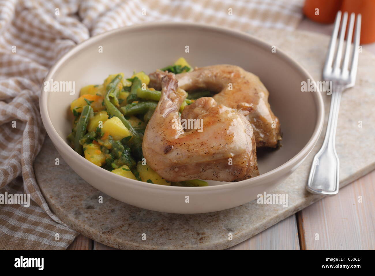 Chicken legs with potatoes and green bean Stock Photo Alamy