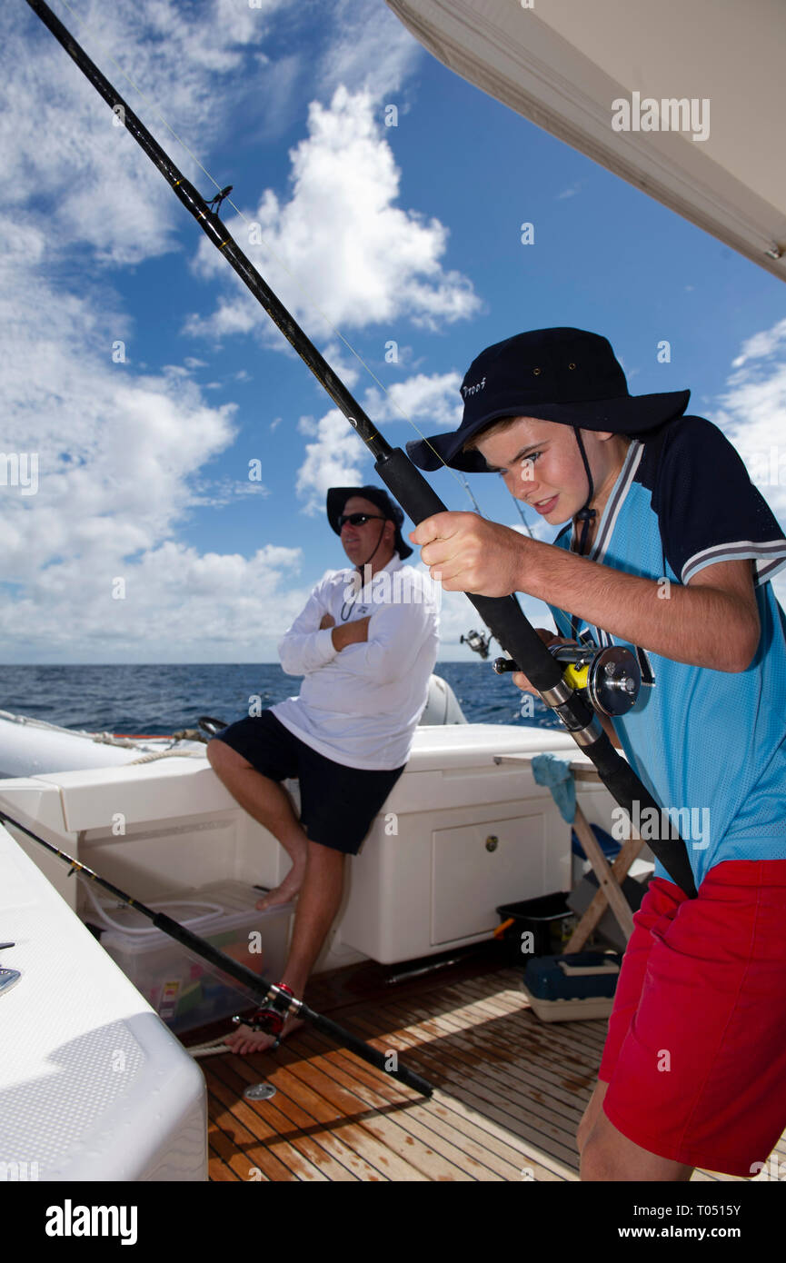 https://c8.alamy.com/comp/T0515Y/a-13-year-old-boy-fishing-recreationally-in-the-easter-group-the-houtman-abrolhos-islands-lie-60-kilometres-off-the-coast-of-geraldton-in-western-au-T0515Y.jpg