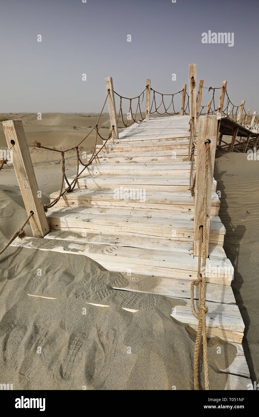 Wooden boardwalks-walkways for visiting the Rawak Stupa. Taklamakan Desert-Xinjiang-China-0041 Stock Photo