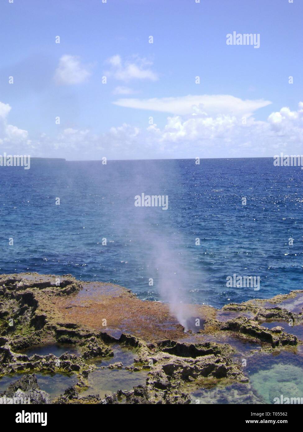 Portrait shot of the famous Blow Hole in the North Field of Tinian, Northern Mariana Islands Stock Photo