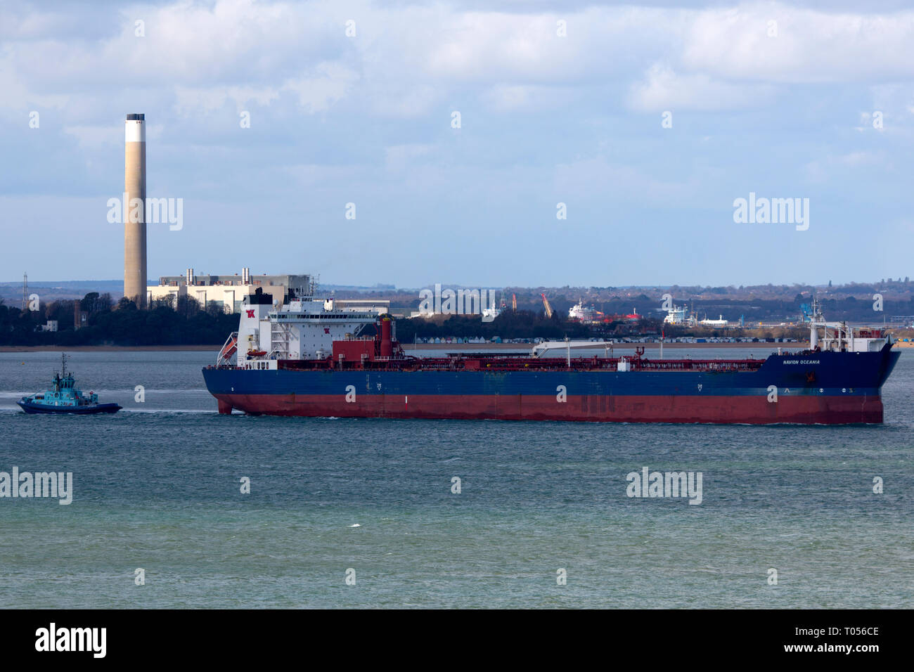 tug assisting, Navion,Voith,Schneider,Oceania,shuttle,oil,tanker,leaving,Fawley,Refinery,Southampton,The Solent,Cowes,Isle of Wight,England,UK, Stock Photo