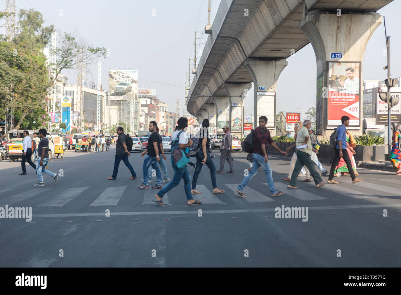Pedestrians cross zebra crossing in Hyderabad,India Stock Photo - Alamy