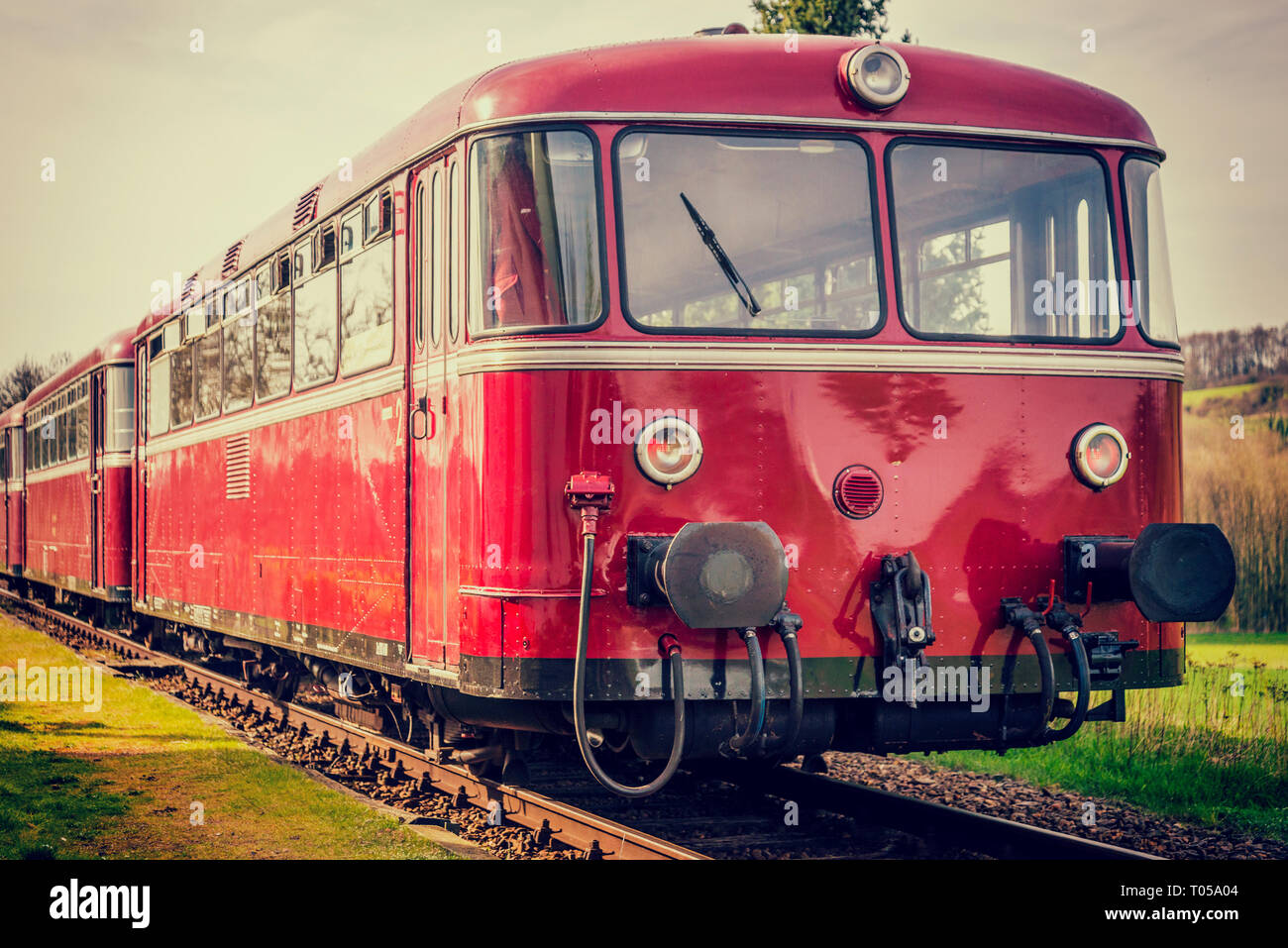 beautiful vintage diesel railbus on railroad with vintage filter Stock Photo