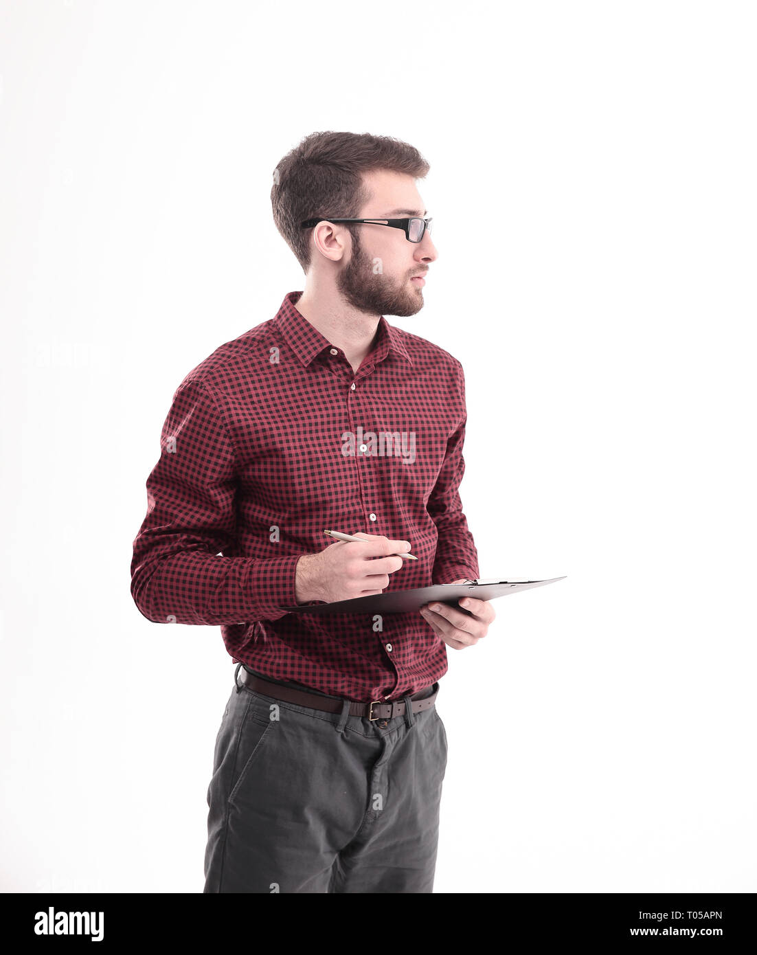 successful young designer with pen and clipboard.isolated on white. Stock Photo