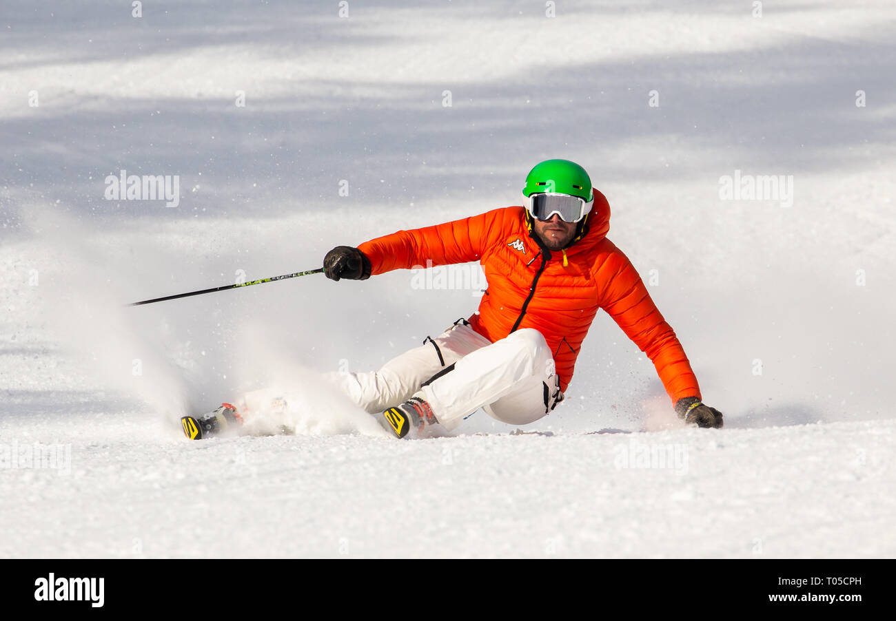 ski instructor in a perfect sport moment. Location: Madonna di Campiglio, in Italy Stock Photo