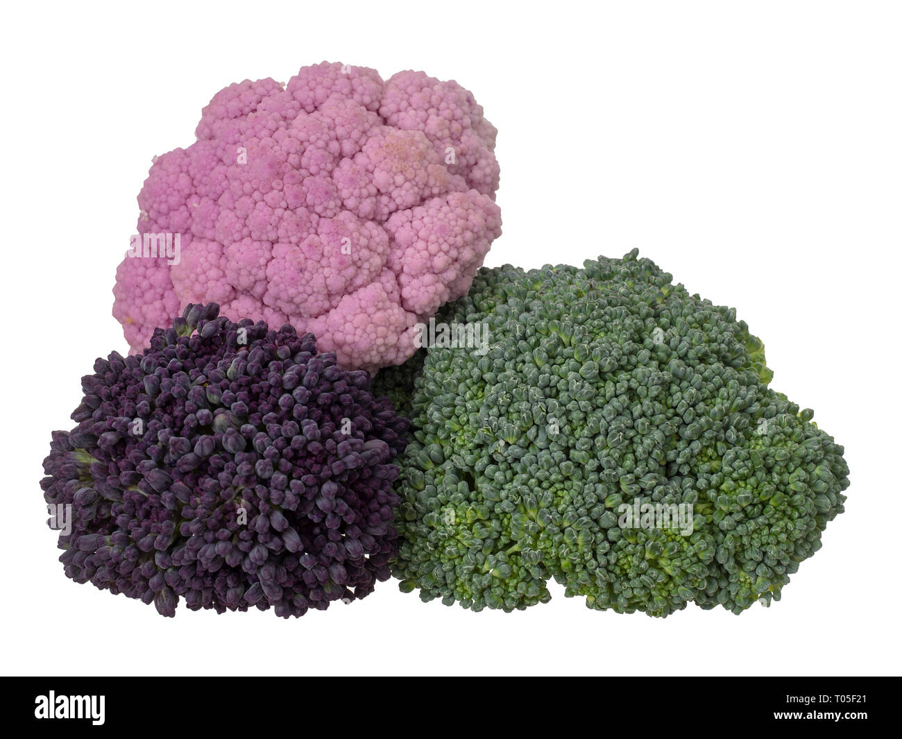 Naturally colourful vegetables, isolated on white. Raw cauliflower, broccoli and purple sprouting florets. Healthy assortment. Stock Photo