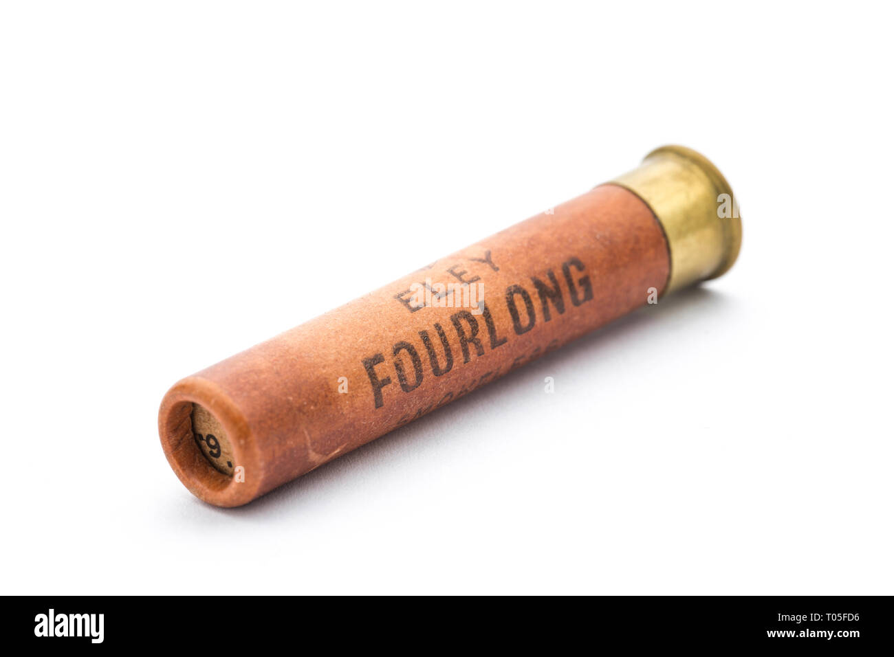 An old paper cased Eley Fourlong .410 shotgun cartridge loaded with No 6 lead shotgun pellets. Collecting shotgun cartridges is a hobby that can be fo Stock Photo