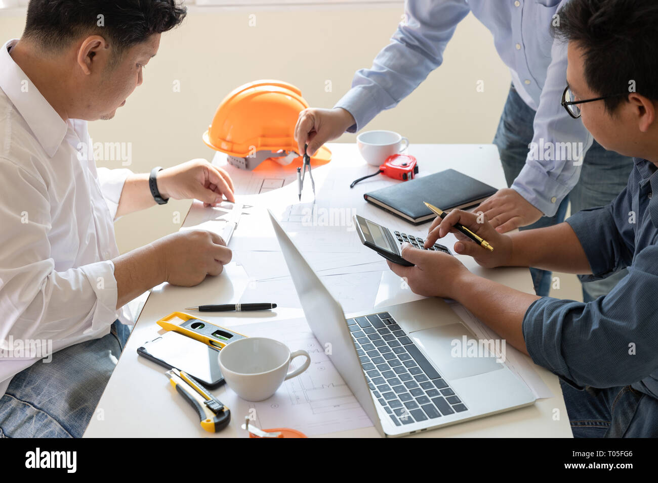 Engineer and Architect concept, Engineer Architects office team working ...