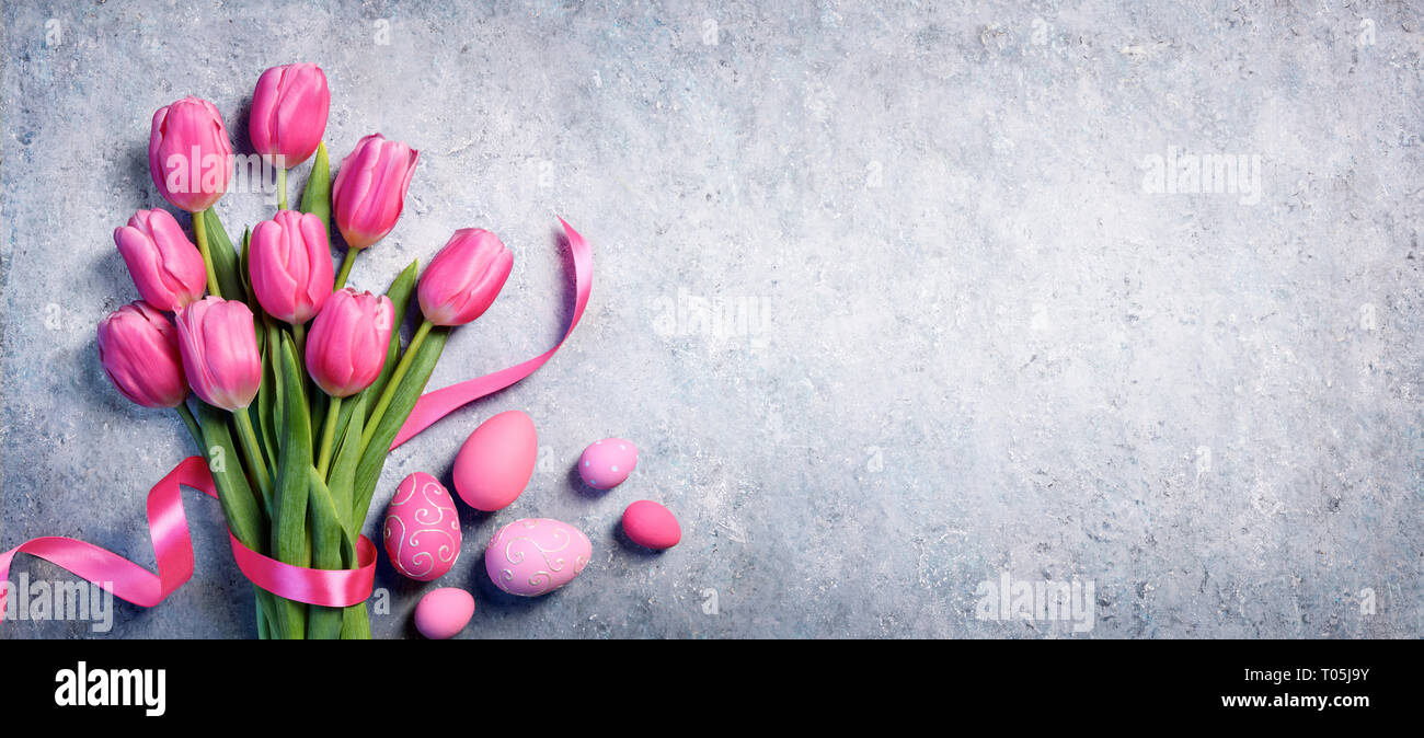 Easter - Tulips Bouquet And Eggs On Gray Background Stock Photo