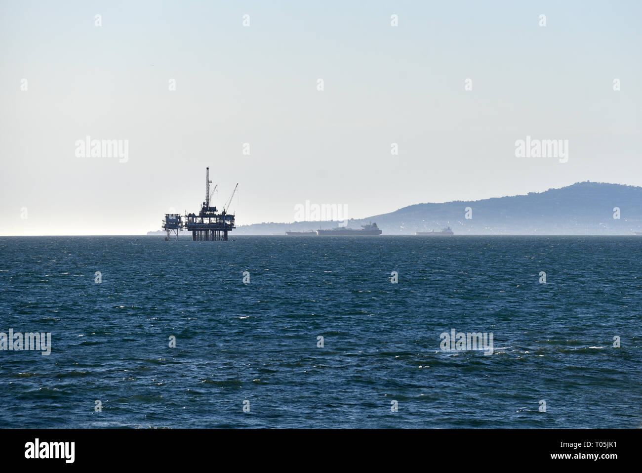 An offshore oil drilling rig of the coast of Southern California Stock