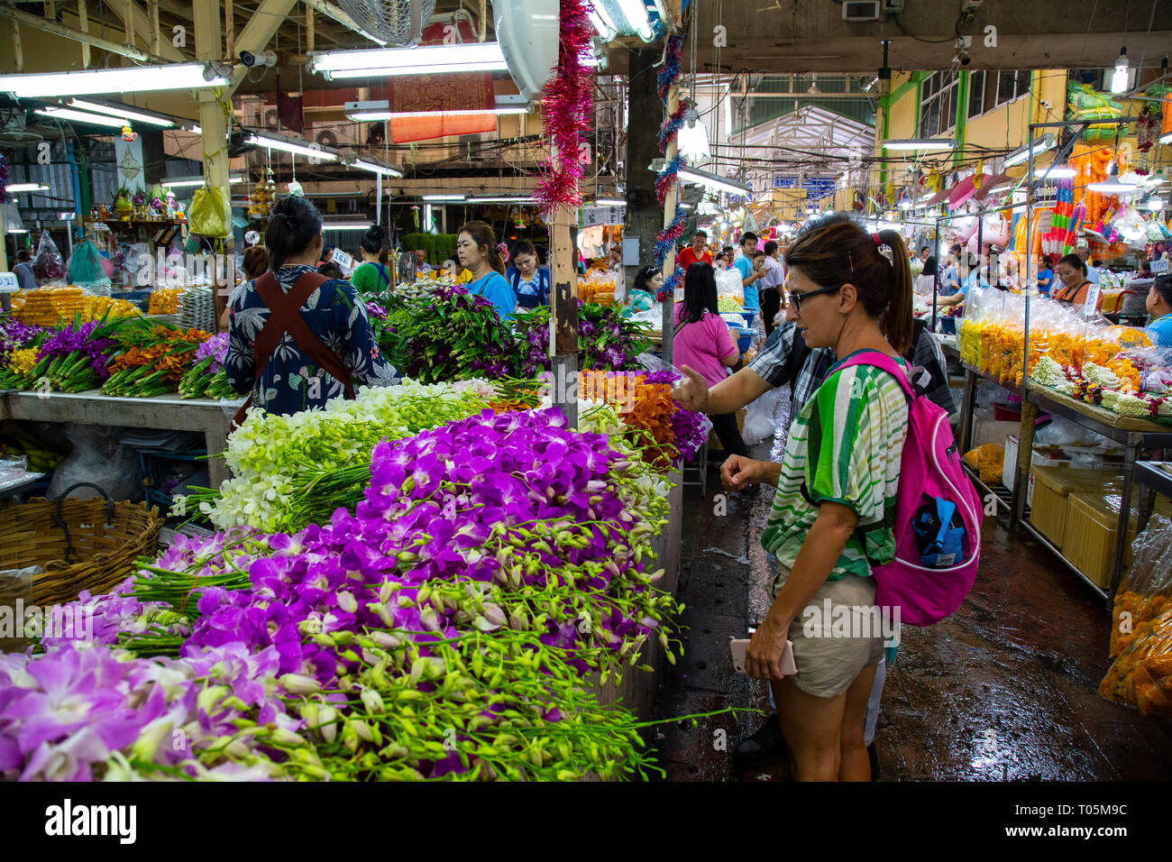 Market of the floes in Bangkok, Thailand. Place where many people, both tourists and locals, come to visit and share Stock Photo