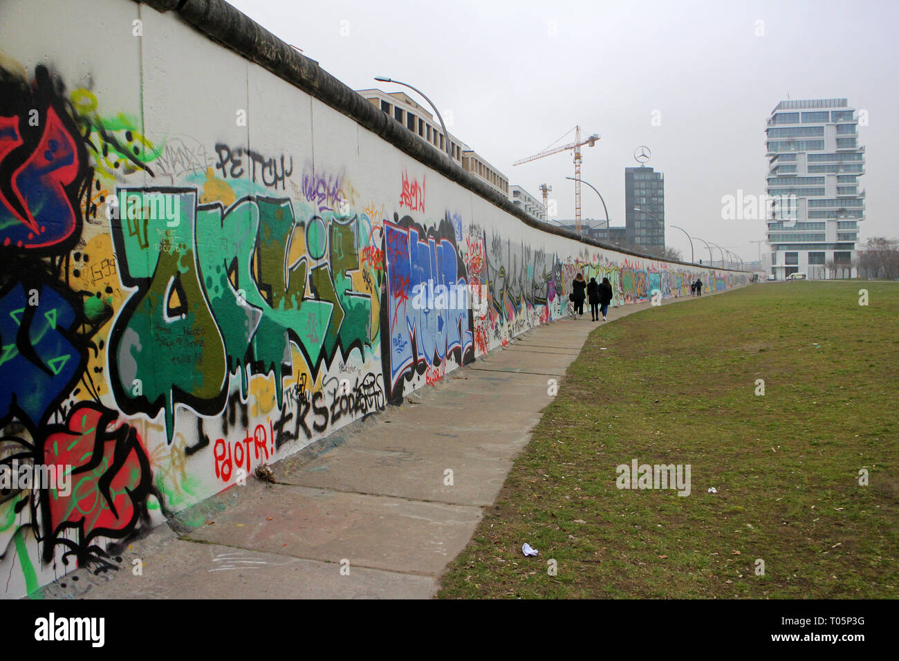 Berlin Wall Graffiti art at the East Side Gallery on Western face of
