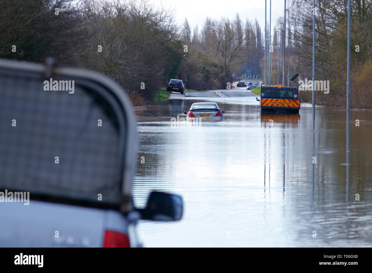 Castleford, UK. 17th March 2019.  Motorists abandon vehicles after getting stuck in flood water, between Castleford & Allerton Bywater. Credit Yorkshire Pics/Alamy Live News Stock Photo