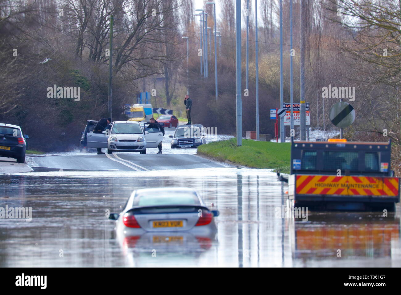 Castleford, UK. 17th March 2019.  Motorists abandon vehicles after getting stuck in flood water, between Castleford & Allerton Bywater. Credit Yorkshire Pics/Alamy Live News Stock Photo