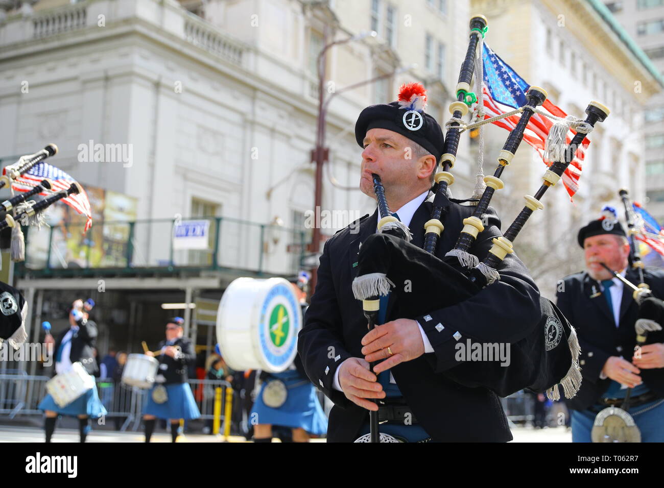 New York, USA . 16th Mar, 2019. Members of the FDNY EMS Pipes and Drums marches in the 2019 NYC