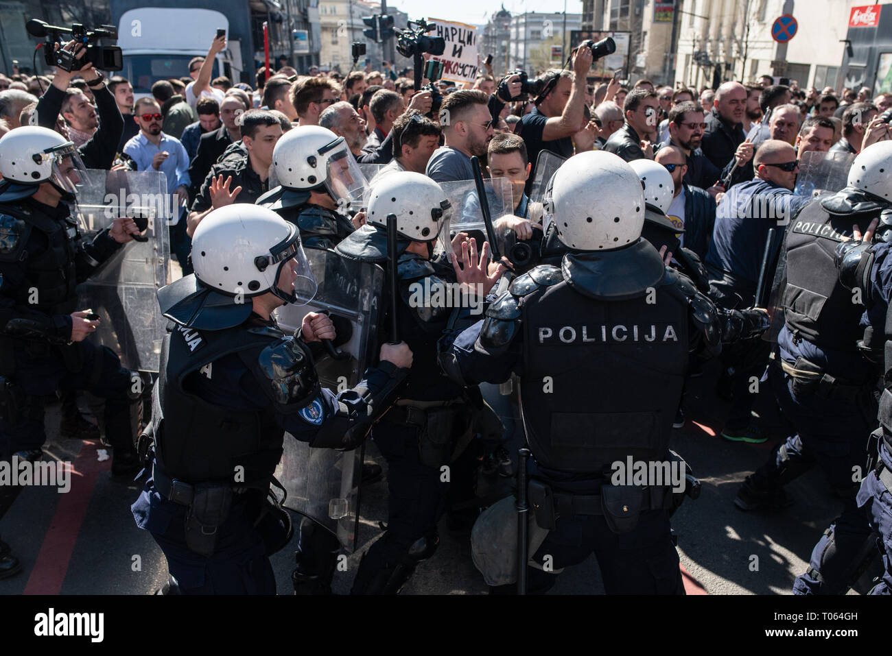 Belgrade, Serbia. 17th Mar, 2019. Anti-government protests near the Presidency of Serbia where President Vucic was addressing nation. Protestors managed to break the cordon in one moment. Credit: Marko Rupena/Alamy Live News Stock Photo