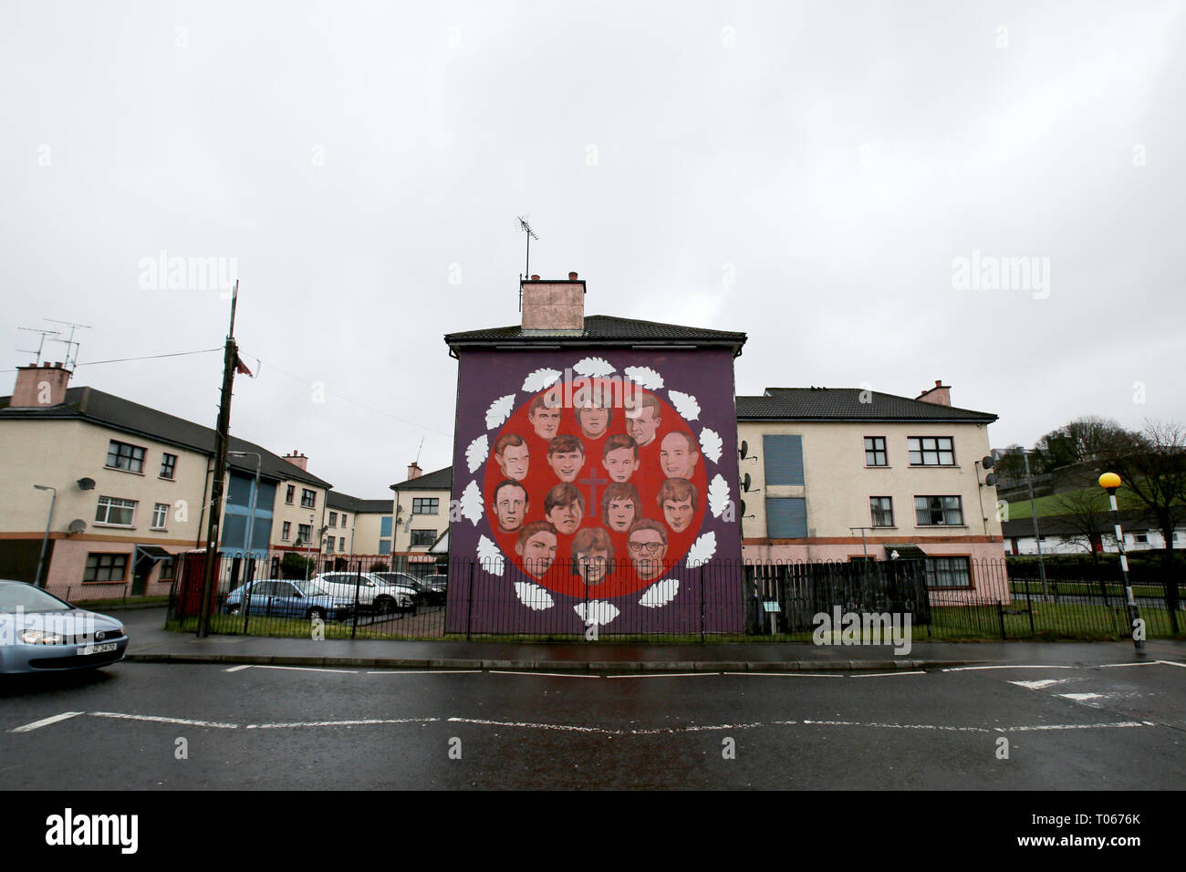 Londonderry, Northern Ireland. 16th Mar 2019. The above mural contains portraits of the 14 people who were killed by the British Army on 'Bloody Sunday' in Derry on 30 January 1972. In addition to the portraits, there are also 14 oak leaves with each leaf symbolising one of the victims, March 16, 2019. - Bloody Sunday, sometimes called the Bogside Massacre, was an incident on 30 January 1972 in the Bogside area of Derry, Northern Ireland, when British soldiers shot 28 unarmed civilians during a protest march against internment. Credit: Irish Eye/Alamy Live News Stock Photo