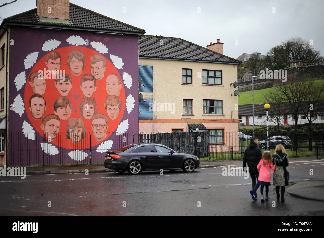 Londonderry, Northern Ireland. 16th Mar 2019. The above mural contains portraits of the 14 people who were killed by the British Army on 'Bloody Sunday' in Derry on 30 January 1972. In addition to the portraits, there are also 14 oak leaves with each leaf symbolising one of the victims, March 16, 2019. - Bloody Sunday, sometimes called the Bogside Massacre, was an incident on 30 January 1972 in the Bogside area of Derry, Northern Ireland, when British soldiers shot 28 unarmed civilians during a protest march against internment. Credit: Irish Eye/Alamy Live News Stock Photo