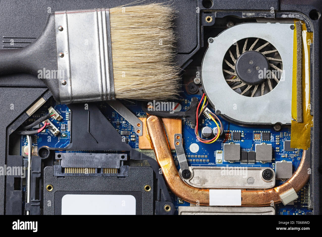 laptop computer motherboard dust cleaning. cpu cooler system with dust