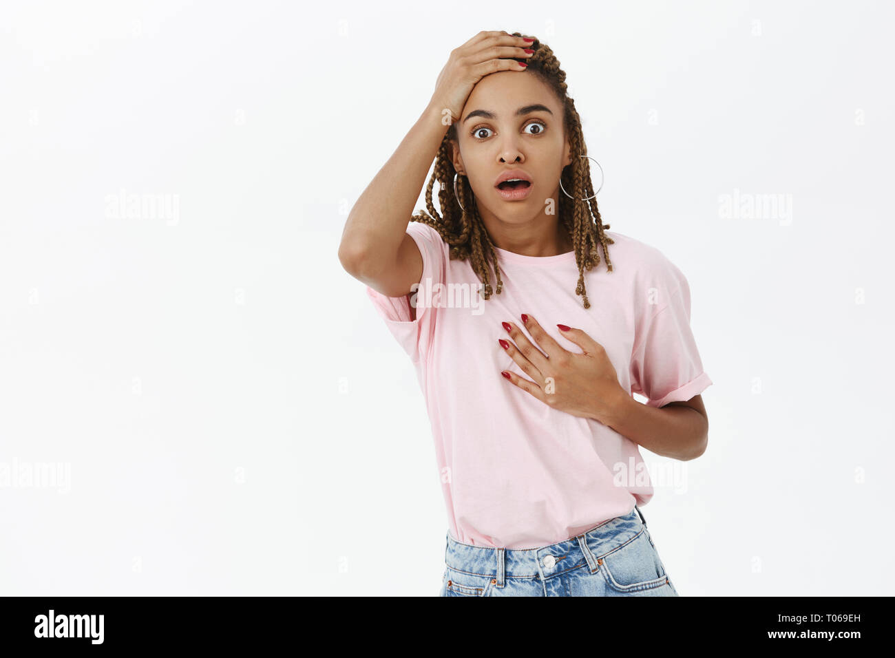 You scared me to death. Portrait of shocked speechless cute dark