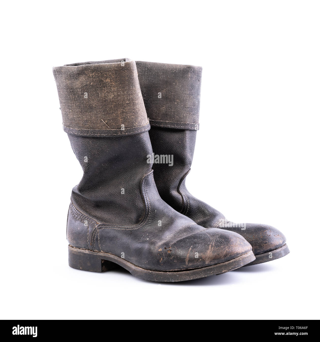 Kirza boots on white background, retro boots, made of artificial leather, used in Soviet Union for soldiers in the army and for work Stock Photo