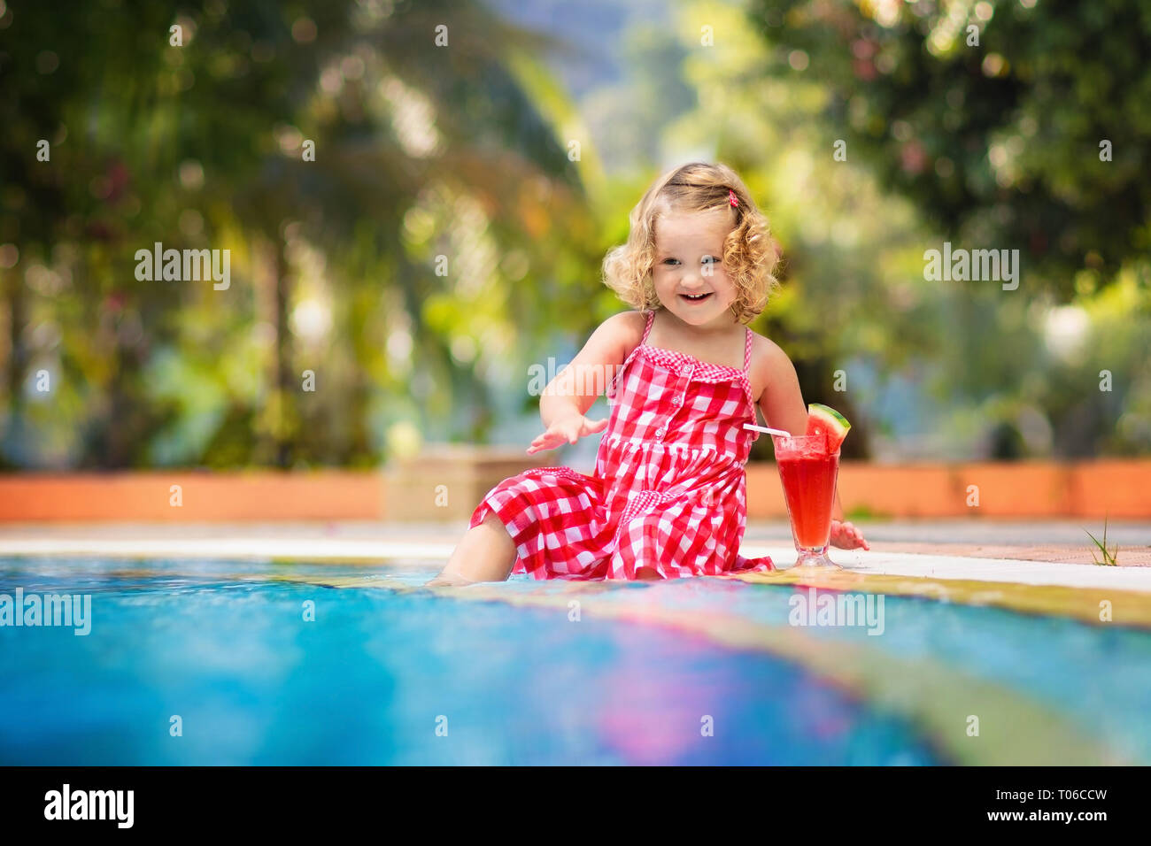 Beautiful Little Girl Cute Toddler With Curly Hair Wearing A Red