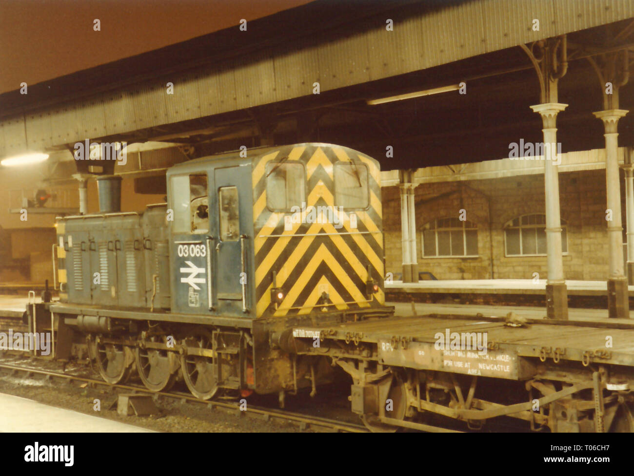Class 03 03063 sits in platform 12 at Newcastle Central Station on 3rd December 1984 with it's runner wagon and parcels vans for 1V50 TPO to Bristol. Stock Photo