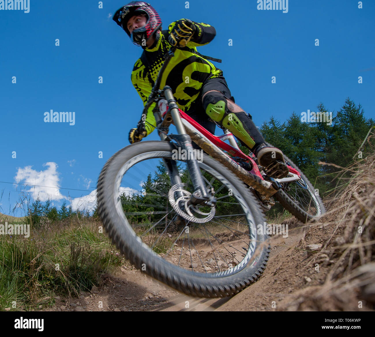 mountain biking down ski slopes