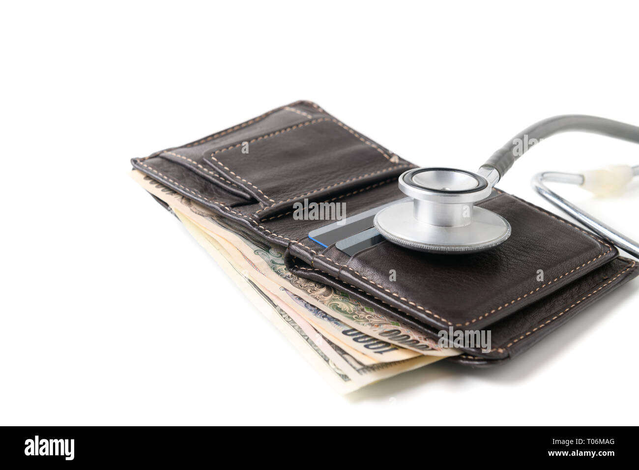 Stethoscope on wallet isolated on white background. Concept of financial crisis and saving health insurance Stock Photo