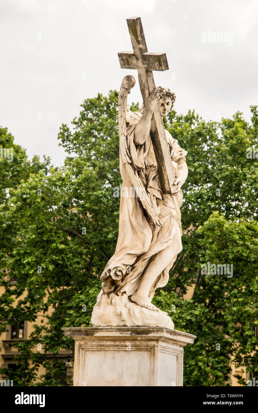 Angel with the Cross statue on Bernini's Bridge of Angels in Rome