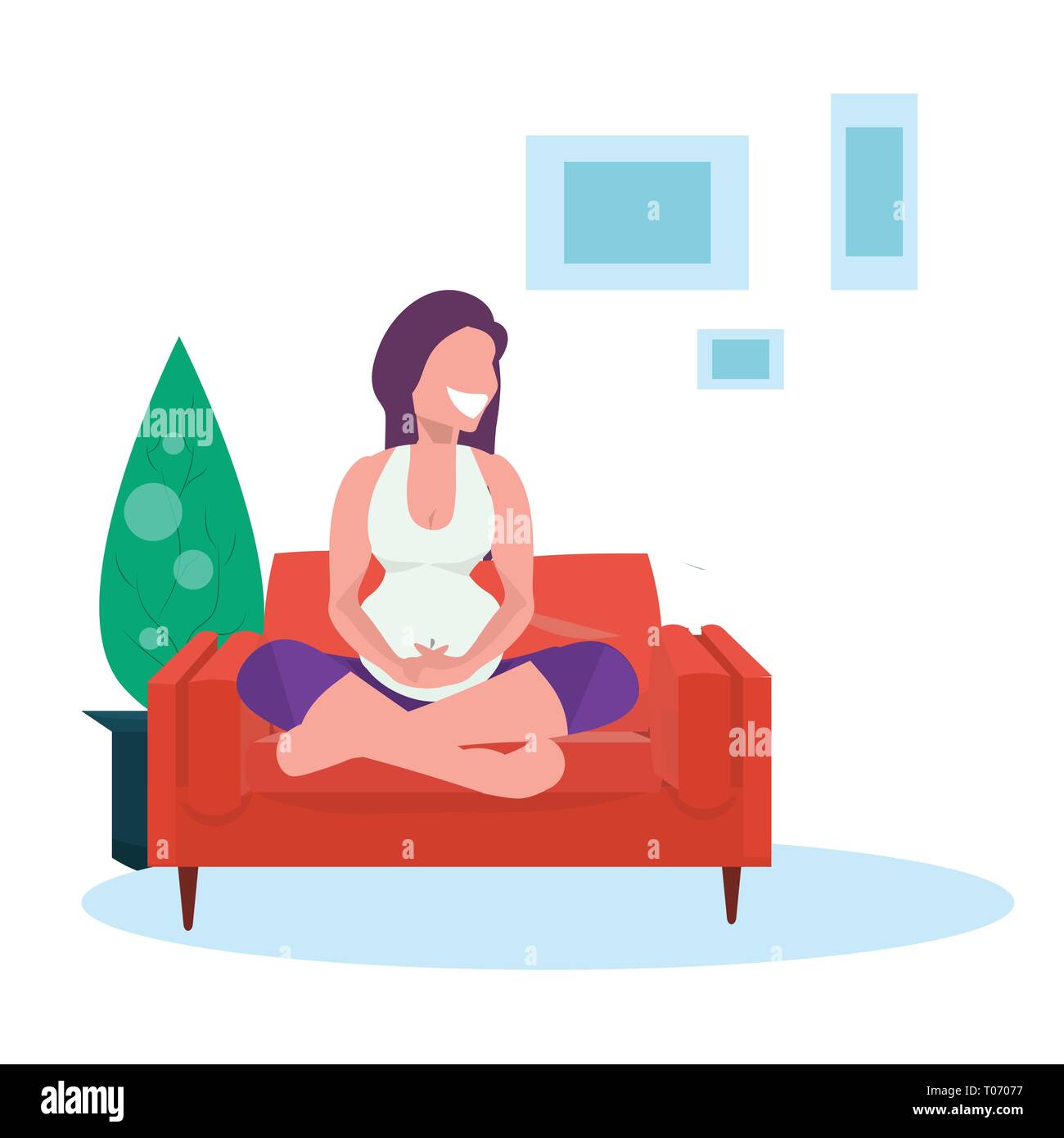 happy pregnant woman sitting lotus pose on couch pregnancy and