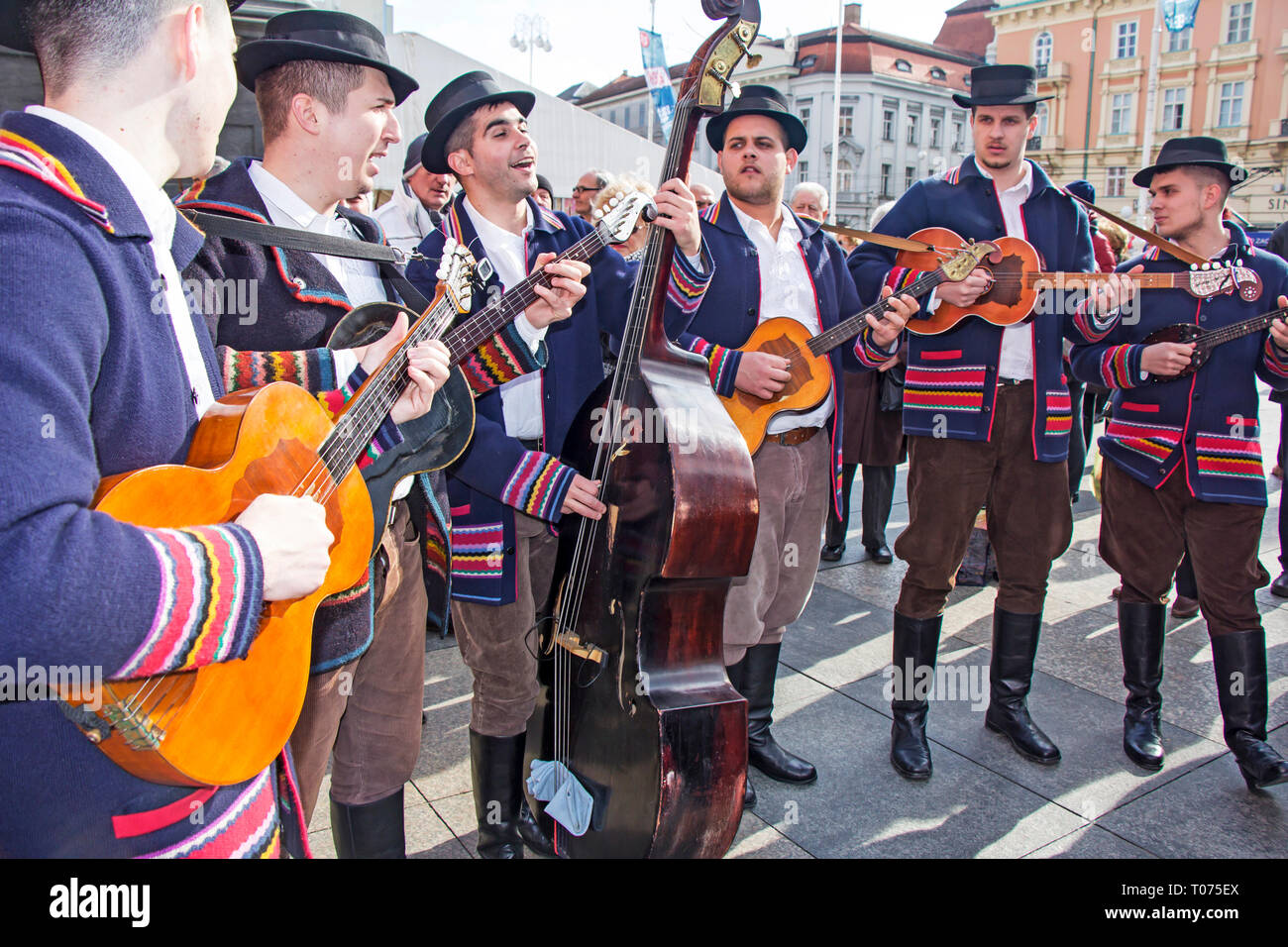 ZAGREB, CROATIA - FEBRUARY 15, 2019: Croatian musicians in traditional Slavonian costumes, play on Ban Jelacic Square in Zagreb, Croatia. Stock Photo