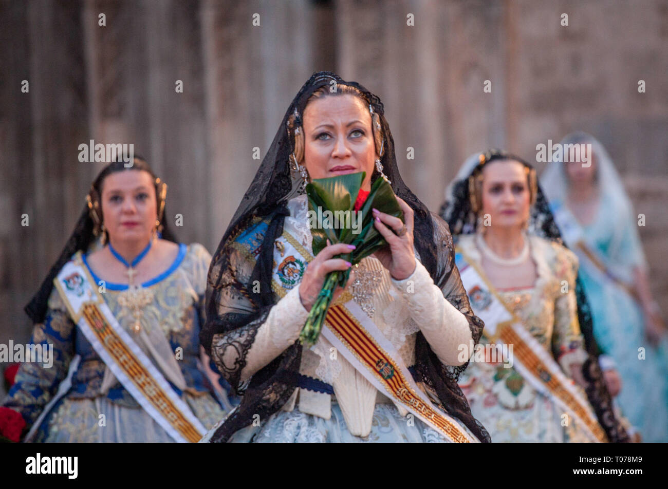 Valencia, Spain. 17th Mar, 2019. Falleras dressed up in traditional ...